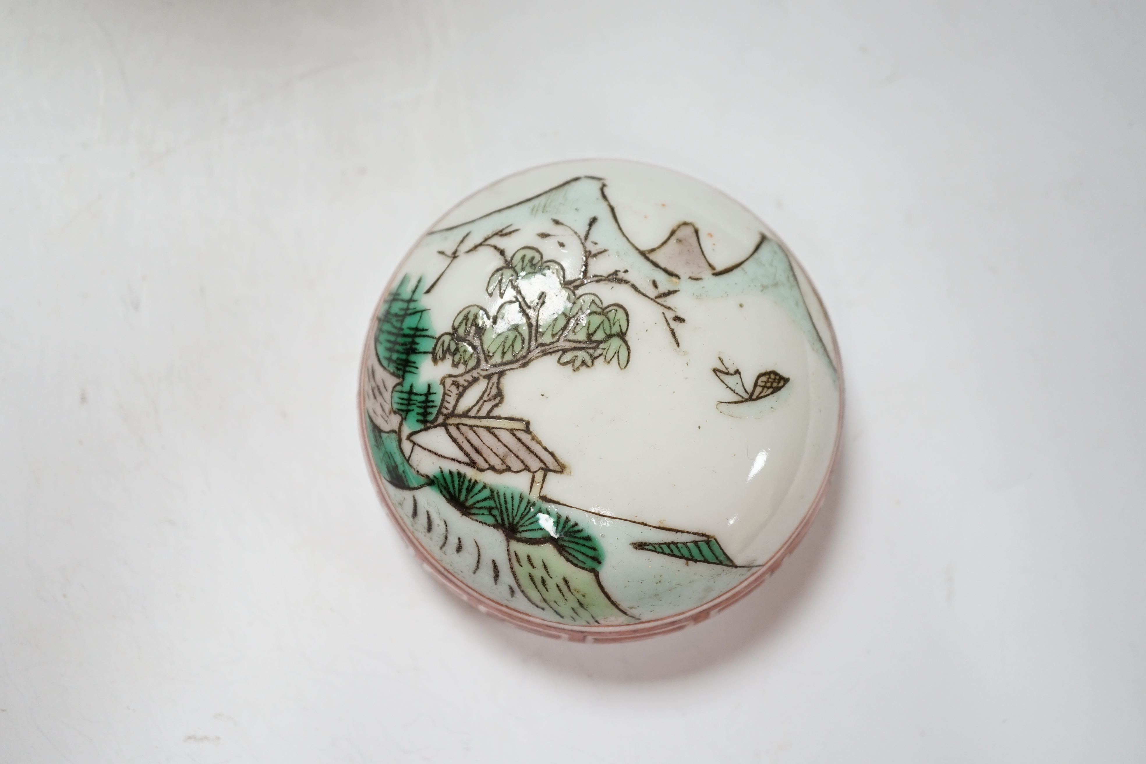 An early 20th century Chinese 'Zhongkui' famille verte jar and cover, 23cm high